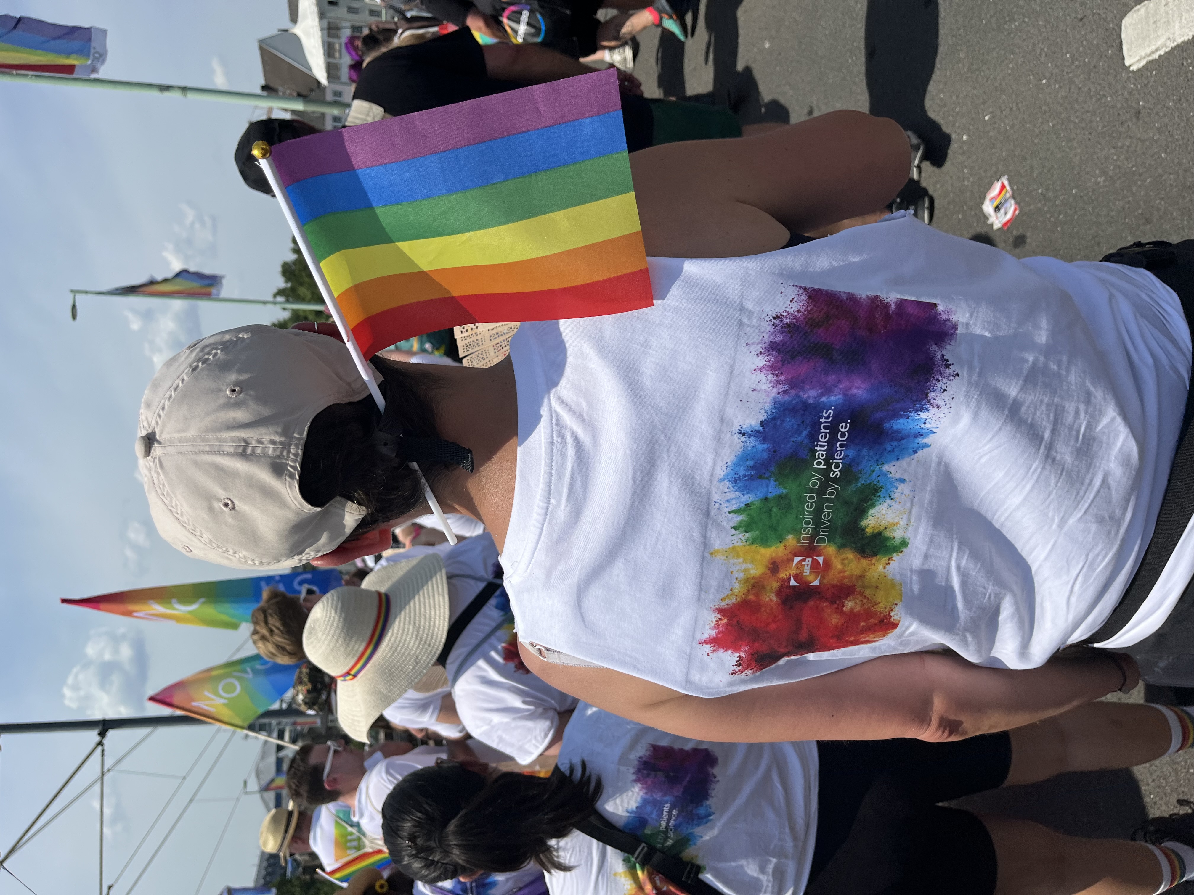 UCB colleague at PrideCologe with colourful UCB tshirt
