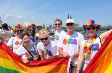 UCB colleagues in colourful outfits at ColognePride